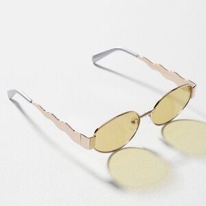 Anthropologie anglo swiggle-arm metal sunglasses